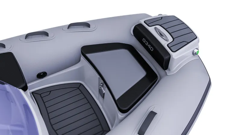 Slide: The Image of 2025 Grand Inflatables G380 boat interior with sleek design and modern features. - 15