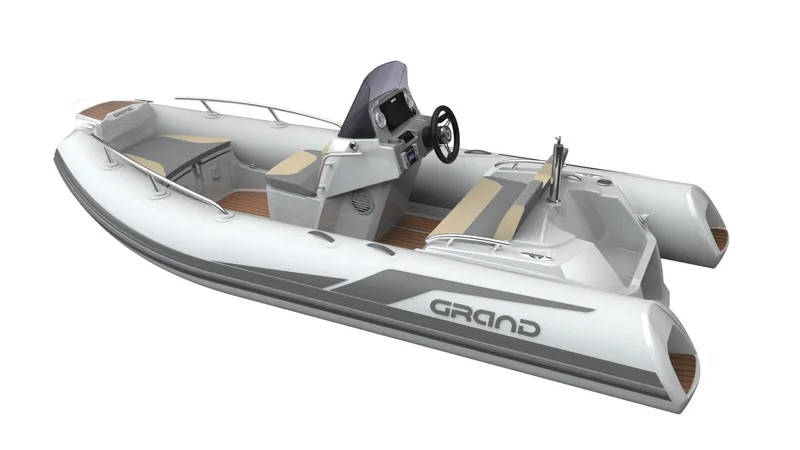 Slide: The Image of 2025 Grand Inflatables G420 boat, sleek design, white and gray, modern console, spacious seating. - 8