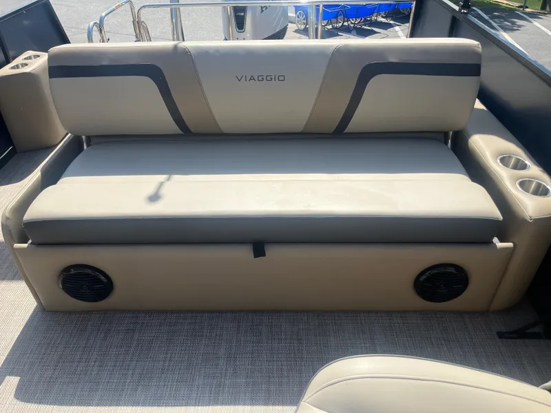 Slide: The Image of Viaggio Lago S 2022 boat seat with cup holders and speakers, beige upholstery. - 18