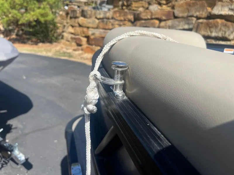 Slide: The Image of A 2022 Viaggio Lago S boat with a rope tied to a cleat on the seat. - 33