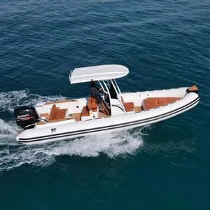 Slide: The Image of 2025 Tiger Marine 740 PL boat cruising on open water. - 3