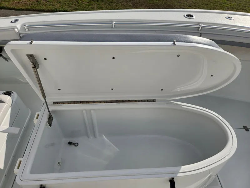 Slide: The Image of Open storage compartment on a 2017 Yellowfin 34 Offshore boat. - 30