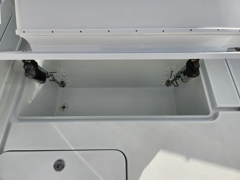 Slide: The Image of Open storage compartment on a 2017 Yellowfin 34 Offshore boat. - 31