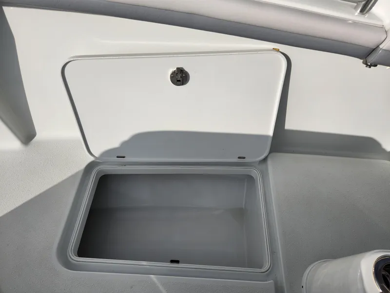 Slide: The Image of Open storage compartment on 2017 Yellowfin 34 Offshore boat deck. - 32