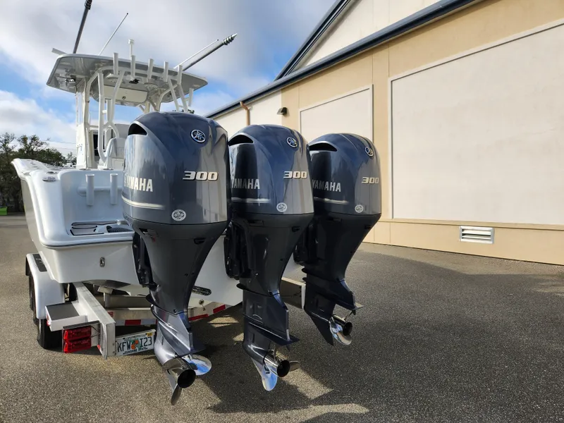 Slide: The Image of 2017 Yellowfin 34 Offshore boat with triple Yamaha 300 outboard engines. - 9