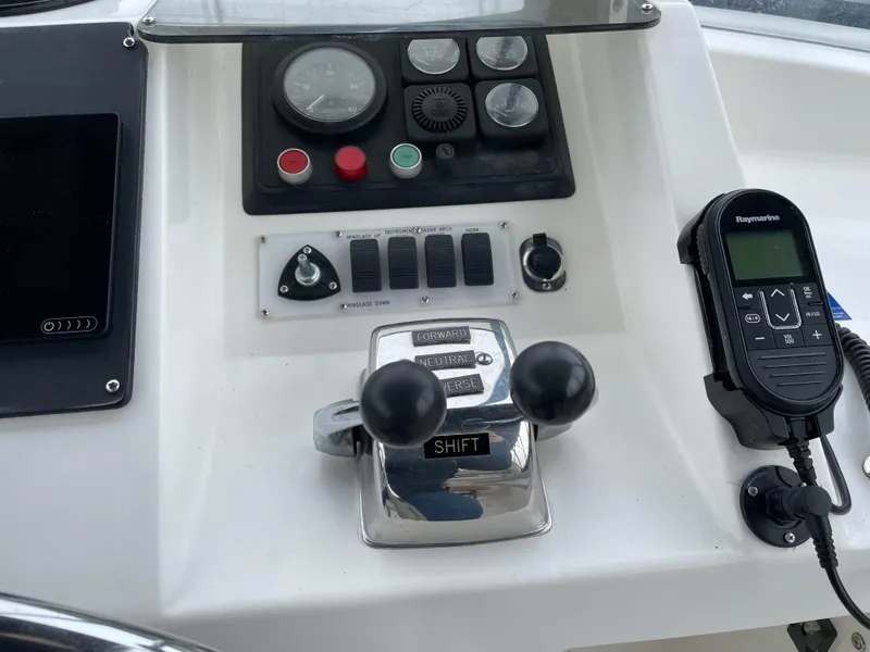 Slide: The Image of Control panel of a 1987 Lien Hwa 47' Mark III Sundeck Motor Yacht. - 12