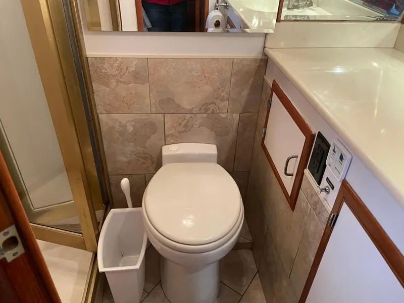 Slide: The Image of 1987 Lien Hwa 47' yacht bathroom with toilet, shower, and vanity. - 35