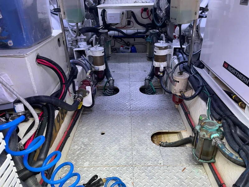 Slide: The Image of Engine room of 1987 Lien Hwa 47' Mark III Sundeck Motor Yacht, showcasing mechanical components. - 38