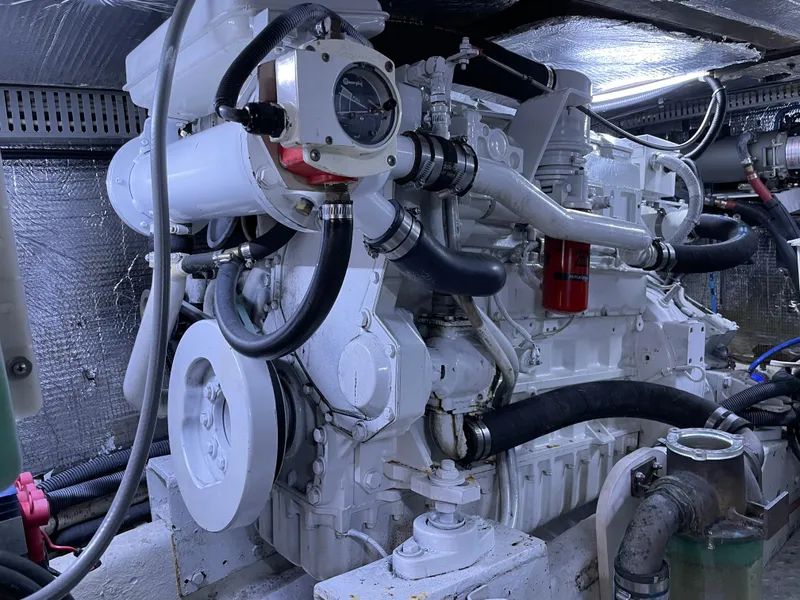 Slide: The Image of Engine room of 1987 Lien Hwa 47' Mark III Sundeck Motor Yacht, showcasing machinery and components. - 43