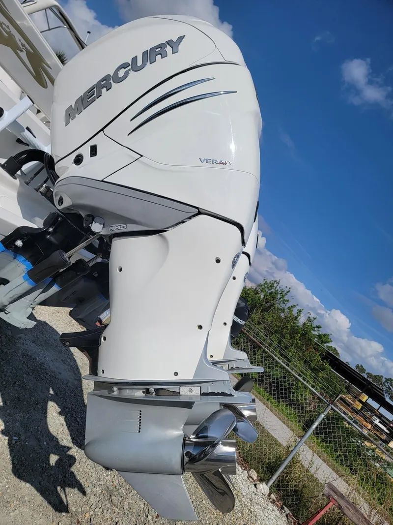Slide: The Image of 2018 Glasstream 328SCX with Mercury Verado outboard motor, parked outdoors. - 11