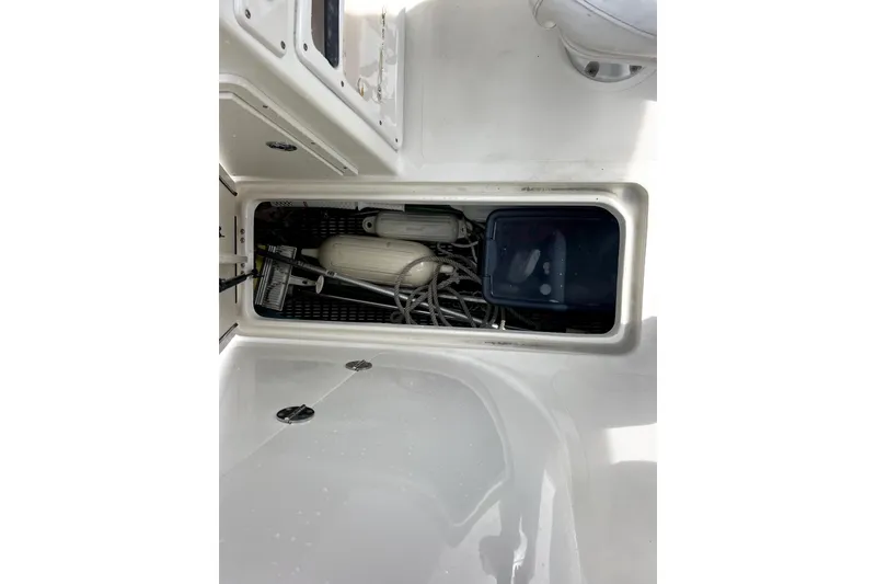 Slide: The Image of Storage compartment on 2008 NauticStar 2000 DC Offshore boat with equipment and accessories. - 18
