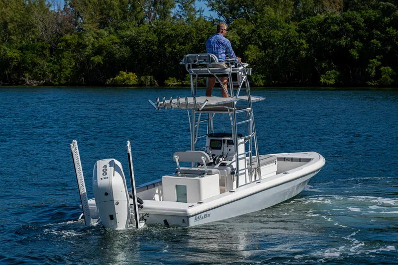 Slide: The Image of 2023 Lake & Bay Backwater boat cruising on a scenic waterway. - 18