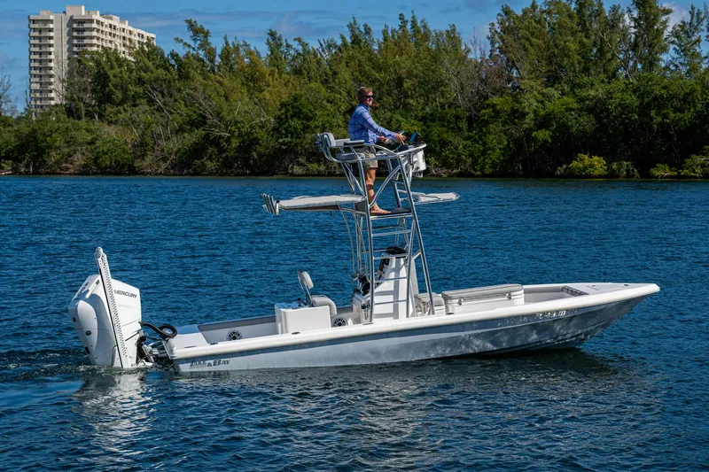 Slide: The Image of 2023 Lake & Bay Backwater boat cruising on a scenic waterway. - 35