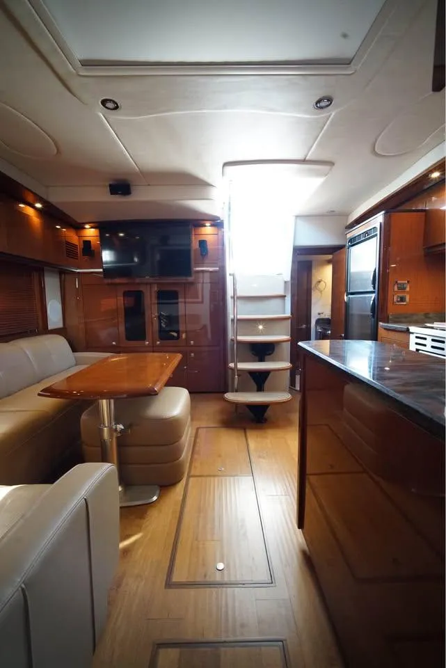 Slide: The Image of Luxurious interior of 2012 Sea Ray 500 Sundancer yacht with modern amenities and elegant design. - 12
