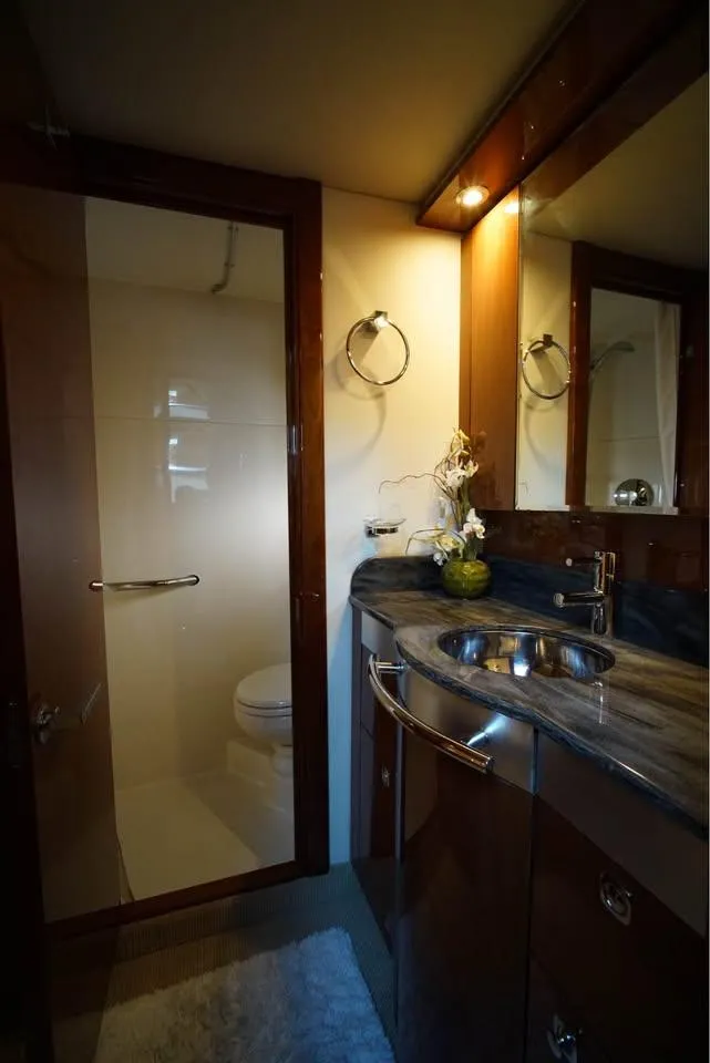 Slide: The Image of Luxurious bathroom in 2012 Sea Ray 500 Sundancer yacht with elegant fixtures and modern design. - 15