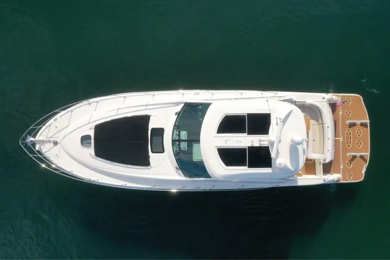 Slide: The Image of Overhead view of 2012 Sea Ray 500 Sundancer yacht on calm water. - 3