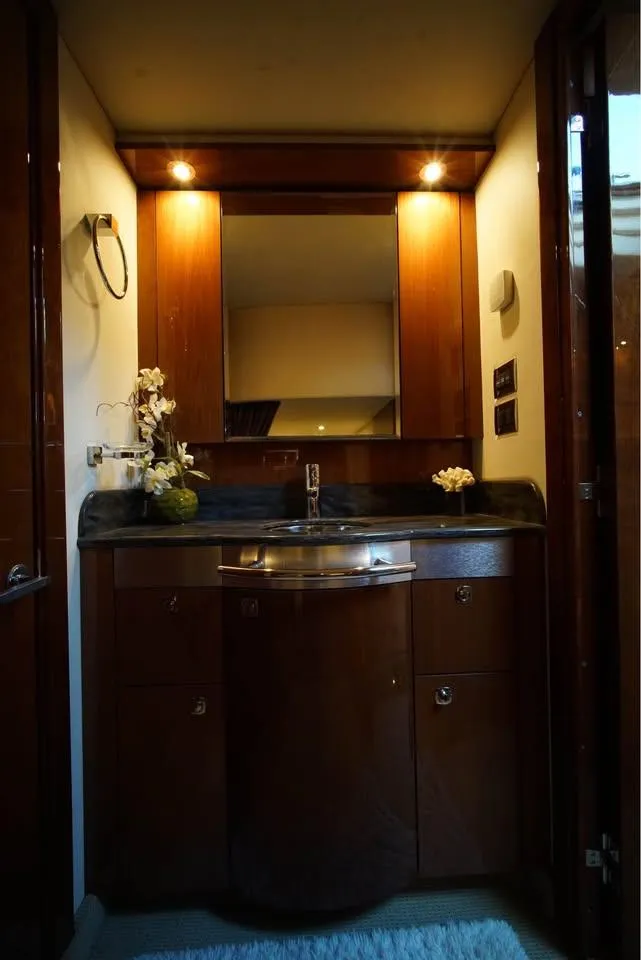 Slide: The Image of Luxurious bathroom interior of 2012 Sea Ray 500 Sundancer yacht with elegant wood cabinetry. - 5