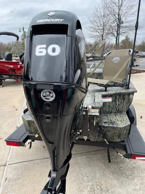 Slide: The Image of 2025 Tracker Grizzly 1650 T Prairie Wings Edition with Mercury 60 outboard motor. - 2