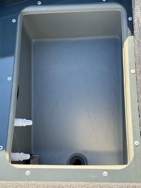 Slide: The Image of 2025 Ranger VS1882SC Angler boat storage compartment, empty and open. - 15