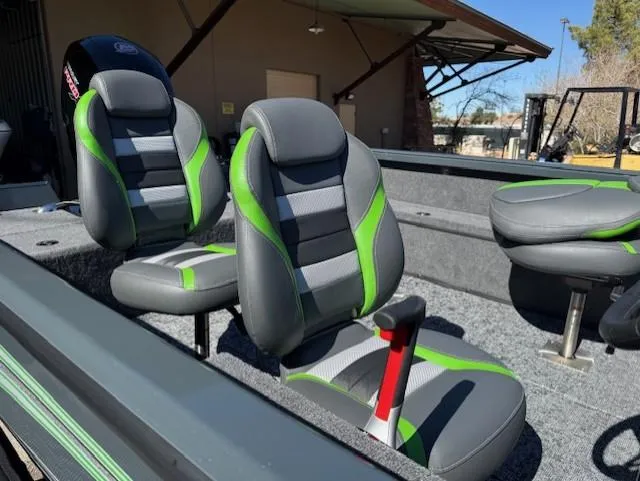 Slide: The Image of 2025 Ranger VS1882SC Angler boat seats with green and gray design. - 3