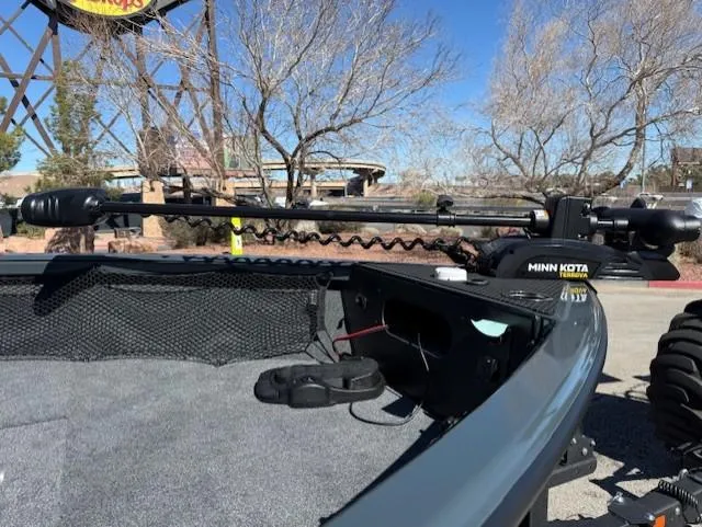 Slide: The Image of 2025 Ranger VS1882SC Angler boat with Minn Kota trolling motor, outdoor setting. - 8