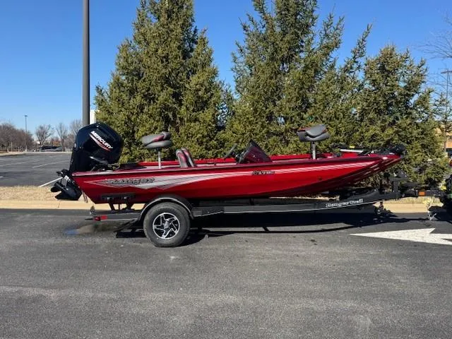 The Image of 2025 Ranger RT178C boat in red, parked on a trailer, outdoors. - 0
