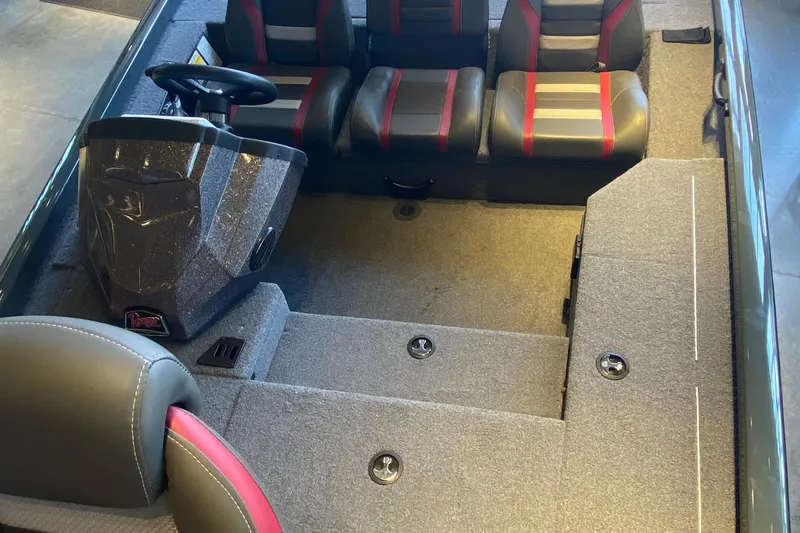 Slide: The Image of 2025 Ranger RT178 boat interior with dual seats and steering console. - 4