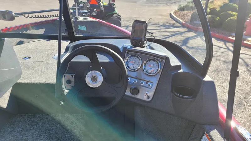 Slide: The Image of 2025 Tracker Pro Guide V-16 WT dashboard with steering wheel and gauges. - 8