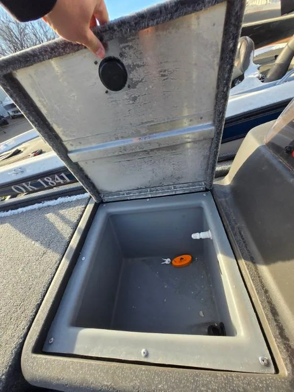 Slide: The Image of Open storage compartment in 2022 Tracker Bass Tracker Classic XL boat. - 8