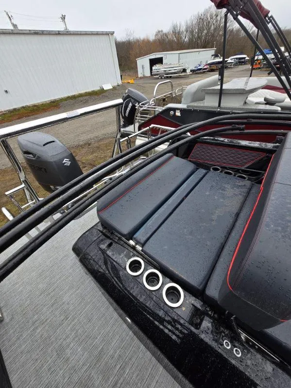 Slide: The Image of 2025 Qwest Splash Pad M-Class boat with sleek seating and modern design. - 4