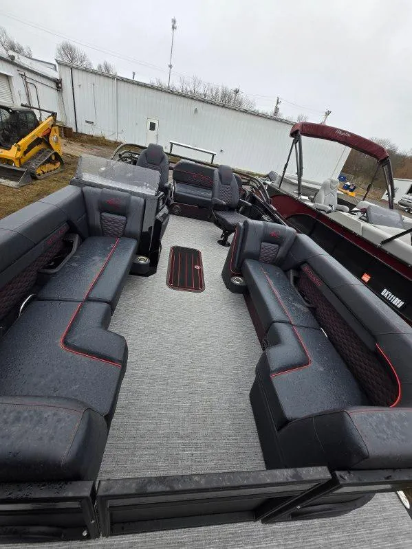 Slide: The Image of 2025 Qwest Splash Pad M-Class boat with spacious seating and modern design. - 6