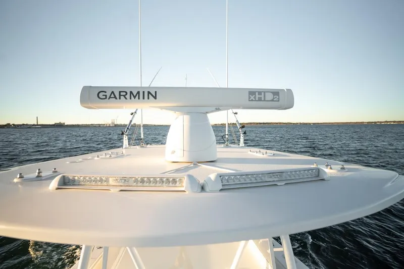 Slide: The Image of 2020 Invincible 36 CC boat with Garmin xHD2 radar on open water. - 11