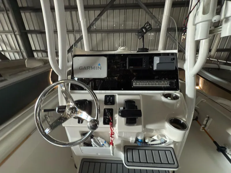 Slide: The Image of 2020 Tidewater 2300 Carolina Bay boat console with Garmin navigation system. - 12