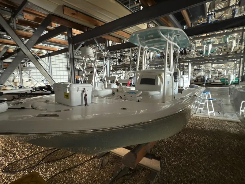 Slide: The Image of 2020 Tidewater 2300 Carolina Bay boat in storage facility. - 23