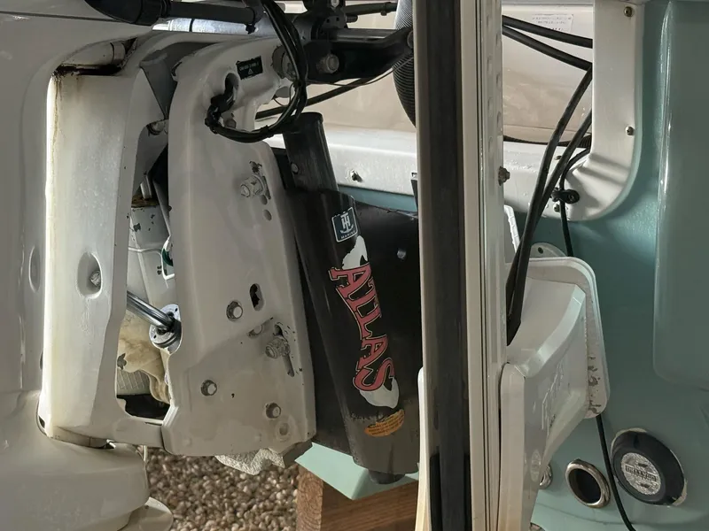 Slide: The Image of Close-up of 2020 Tidewater 2300 Carolina Bay boat engine components. - 25