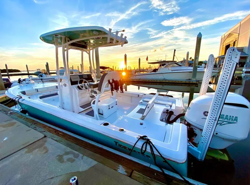 Slide: The Image of 2020 Tidewater 2300 Carolina Bay boat docked at sunset with Yamaha engine. - 3