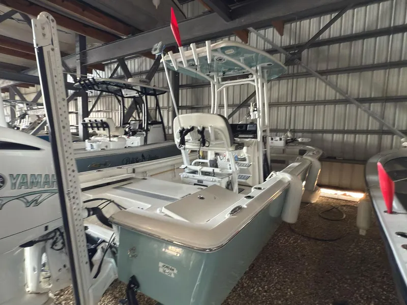 Slide: The Image of 2020 Tidewater 2300 Carolina Bay boat in storage, featuring Yamaha engine. - 7
