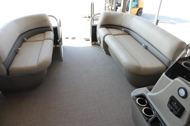 Slide: The Image of 2025 Sun Tracker Party Barge 16 DLX interior with spacious seating and modern amenities. - 7