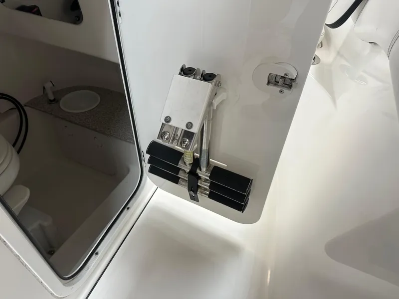 Slide: The Image of 2020 Sea Pro 259 Center Console boat interior detail with hatch and hardware. - 14