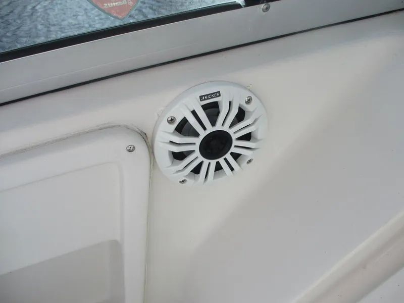 Slide: The Image of White speaker installed on a 1997 Pro-Line 251 WA boat interior. - 20
