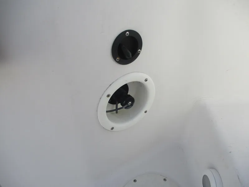 Slide: The Image of 1997 Pro-Line 251 WA boat interior detail showing control switches and fittings. - 32