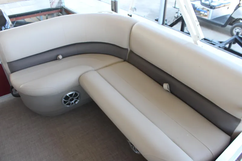 Slide: The Image of 2025 Sun Tracker Bass Buggy 16 XL Select boat seating, beige and gray upholstery. - 10