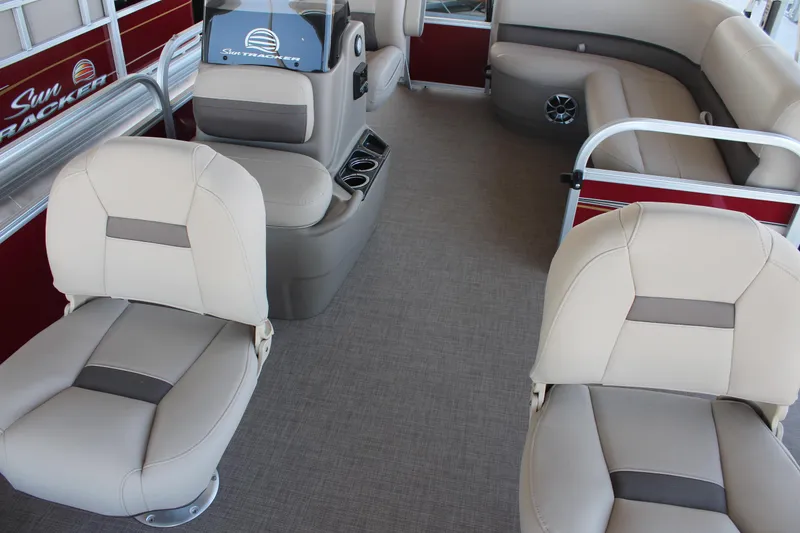 Slide: The Image of 2025 Sun Tracker Bass Buggy 16 XL Select interior with beige seating and modern design. - 8