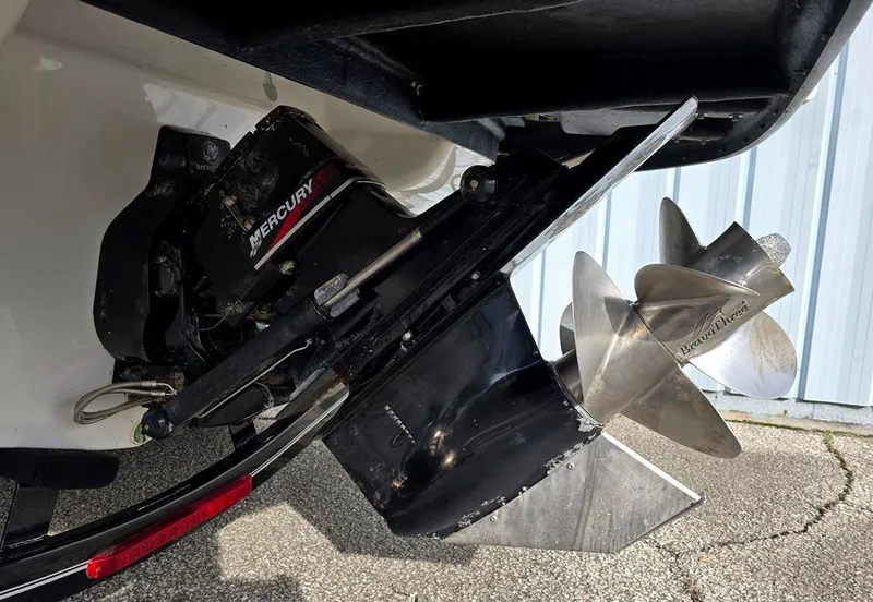 Slide: The Image of 2011 Crownline 230LS BR boat with Mercury outboard motor and stainless steel propeller. - 20