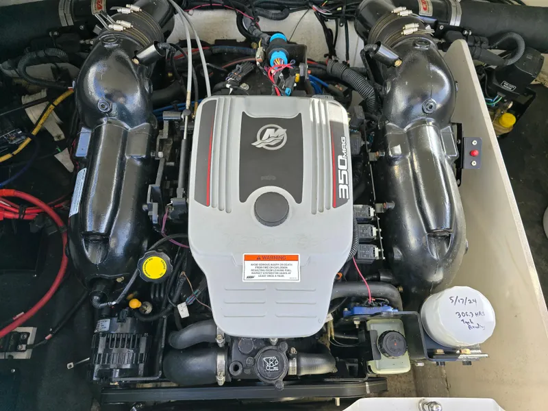 Slide: The Image of 2011 Crownline 230LS BR boat engine, featuring a 350 MAG motor. - 22