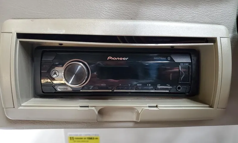 Slide: The Image of Pioneer stereo system in 2011 Crownline 230LS BR boat dashboard. - 25