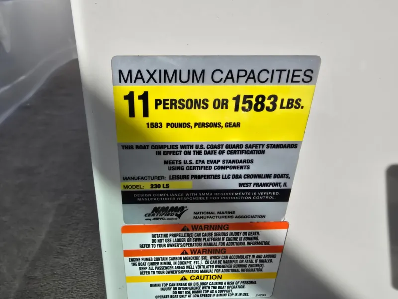 Slide: The Image of Maximum capacity label on 2011 Crownline 230LS BR boat: 11 persons or 1583 lbs. - 30