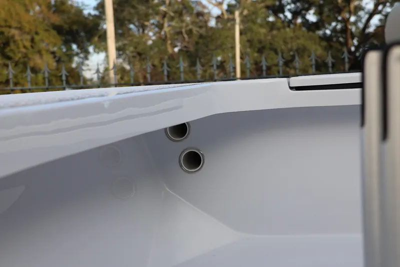 Slide: The Image of Custom Texar Flats Hybrid 16 boat interior detail, 2025 model, showcasing sleek design and craftsmanship. - 10