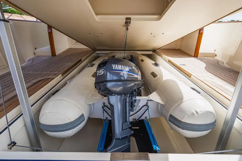 Slide: The Image of 2015 Palm Beach Motor Yachts PB52 with Yamaha outboard motor in storage compartment. - 12