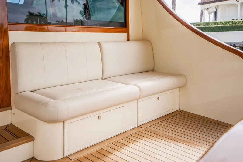 Slide: The Image of Luxurious seating on 2015 Palm Beach Motor Yachts PB52 with elegant wood accents. - 20